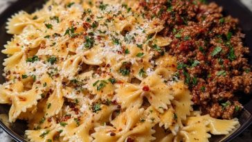 Cheesy Bowtie Pasta with Savory Cajun Ground Beef in Garlic Cream