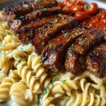 Cheesy Cajun Steak Pasta with Garlic Parmesan Sauce