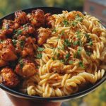 Garlic Butter Chicken Bites with Spicy Cajun Alfredo Twisted Pasta