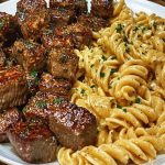Garlic Butter Steak Bites with Spicy Cajun Alfredo Twisted Pasta